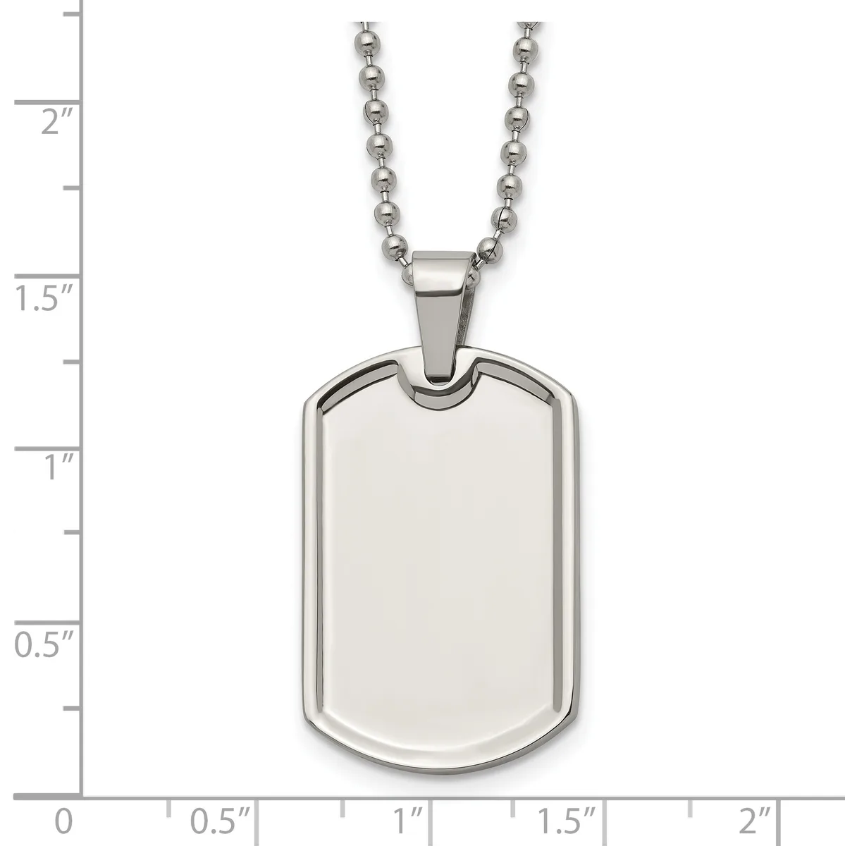 A polished stainless steel dog tag pendant with rounded corners hangs from a beaded chain, displayed against a measurement scale showing the tag is approximately one inch tall.