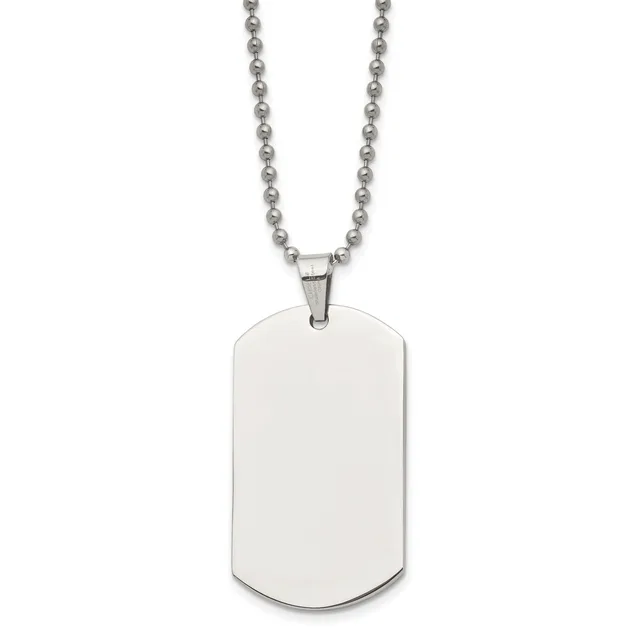 A polished stainless steel dog tag pendant hanging from a ball chain necklace against a white background.