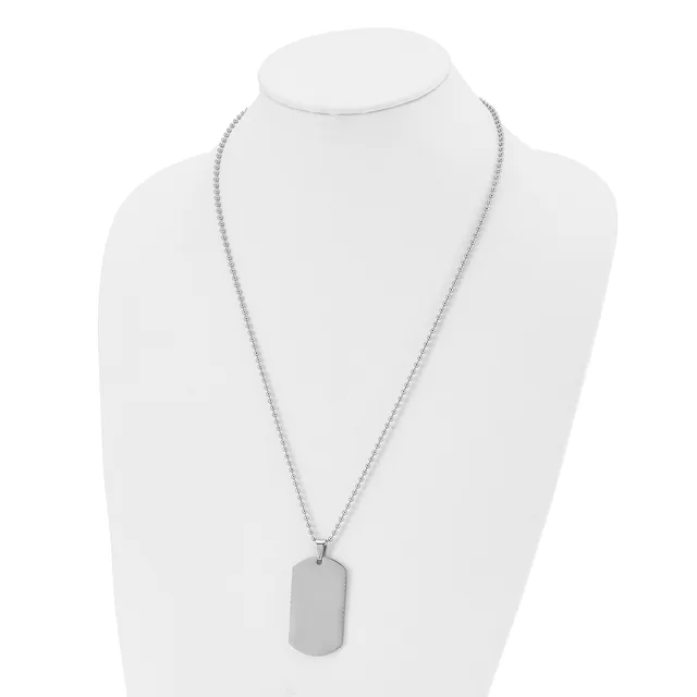 A silver-toned chain necklace with a rectangular dog tag pendant displayed on a white mannequin bust.
