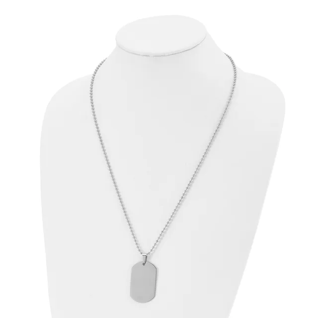 Silver-toned chain necklace with a rectangular pendant displayed on a white mannequin bust.