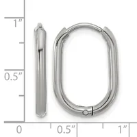 Two silver-toned oval hoop earrings displayed next to a ruler showing approximately one inch in length and half inch in width.