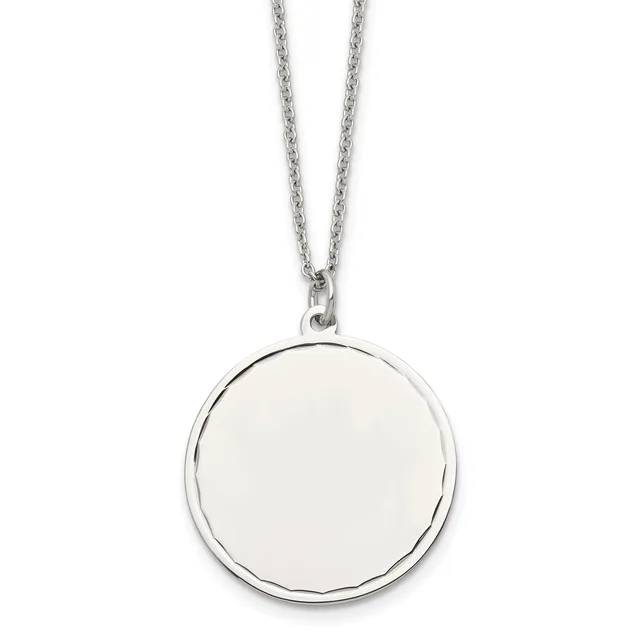 A silver chain necklace with a large round pendant featuring a polished white or cream-colored circular face surrounded by a textured silver rim.