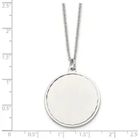 A silver circular pendant with a polished finish hangs from a thin chain, displayed against a ruler showing the pendant is approximately one inch in diameter.