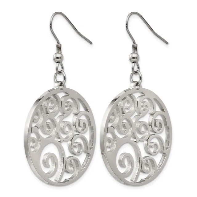 A pair of silver-toned oval dangle earrings with filigree spiral cutout patterns, suspended from fish hook wires.