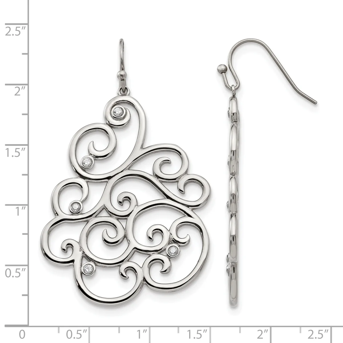 A pair of silver ornamental spiral dangle earrings with swirling filigree design, shown front and side view against a measurement scale.