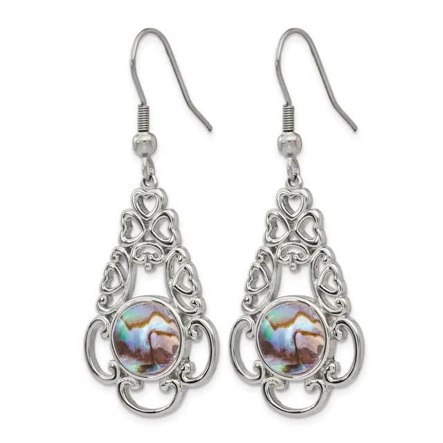 Pair of silver-toned ornate teardrop earrings with heart cutouts and iridescent round stone centers, suspended from silver fish-hook wires.