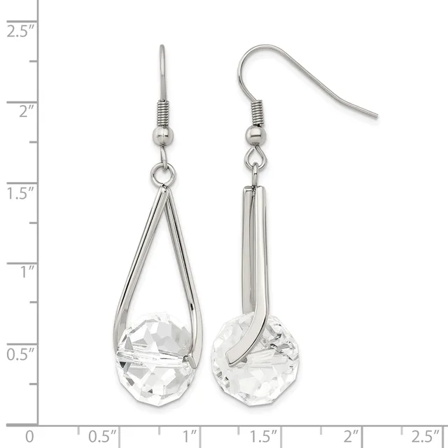 A pair of silver-toned dangle earrings with teardrop-shaped clear crystal stones, displayed against a ruler showing measurements up to 2.5 inches.