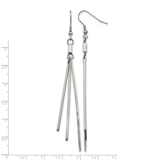 A pair of silver-toned dangling earrings with chain strands extending from hook closures, displayed against a measurement ruler.