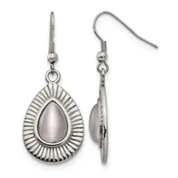 A pair of silver teardrop earrings with radiating linear detailing around the border and a polished oval stone cabochon in the center, shown from front and side views.
