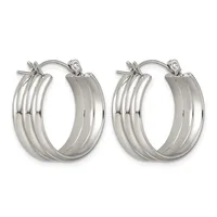 A pair of polished silver-toned hoop earrings with triple grooved bands and hinged posts, displayed side by side.
