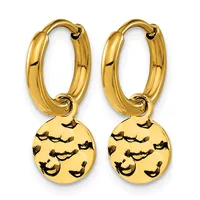 A pair of gold hoop earrings with dangling circular charms stamped with smiling face designs.