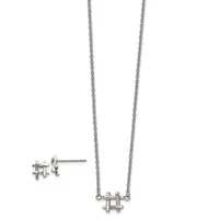 Silver-toned puzzle piece necklace and matching stud earrings displayed on a white background.