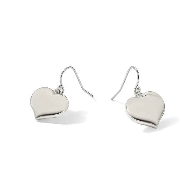 A pair of silver heart-shaped drop earrings with polished surfaces, suspended from curved wire hooks.
