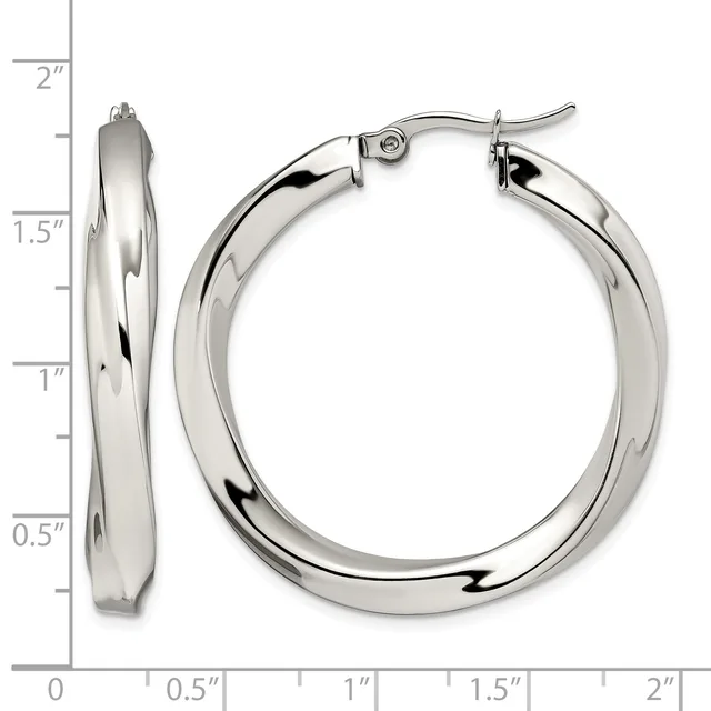 A pair of polished silver-toned hoop earrings with a twisted texture, shown from front and side views against a measurement scale indicating approximately 1.5 inches in diameter.