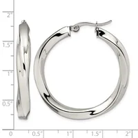 A pair of polished silver-toned hoop earrings with a twisted texture, shown from front and side views against a measurement scale indicating approximately 1.5 inches in diameter.