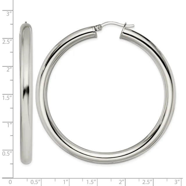 A pair of polished silver hoop earrings with a measurement scale showing their size is approximately 2.5 inches in diameter.