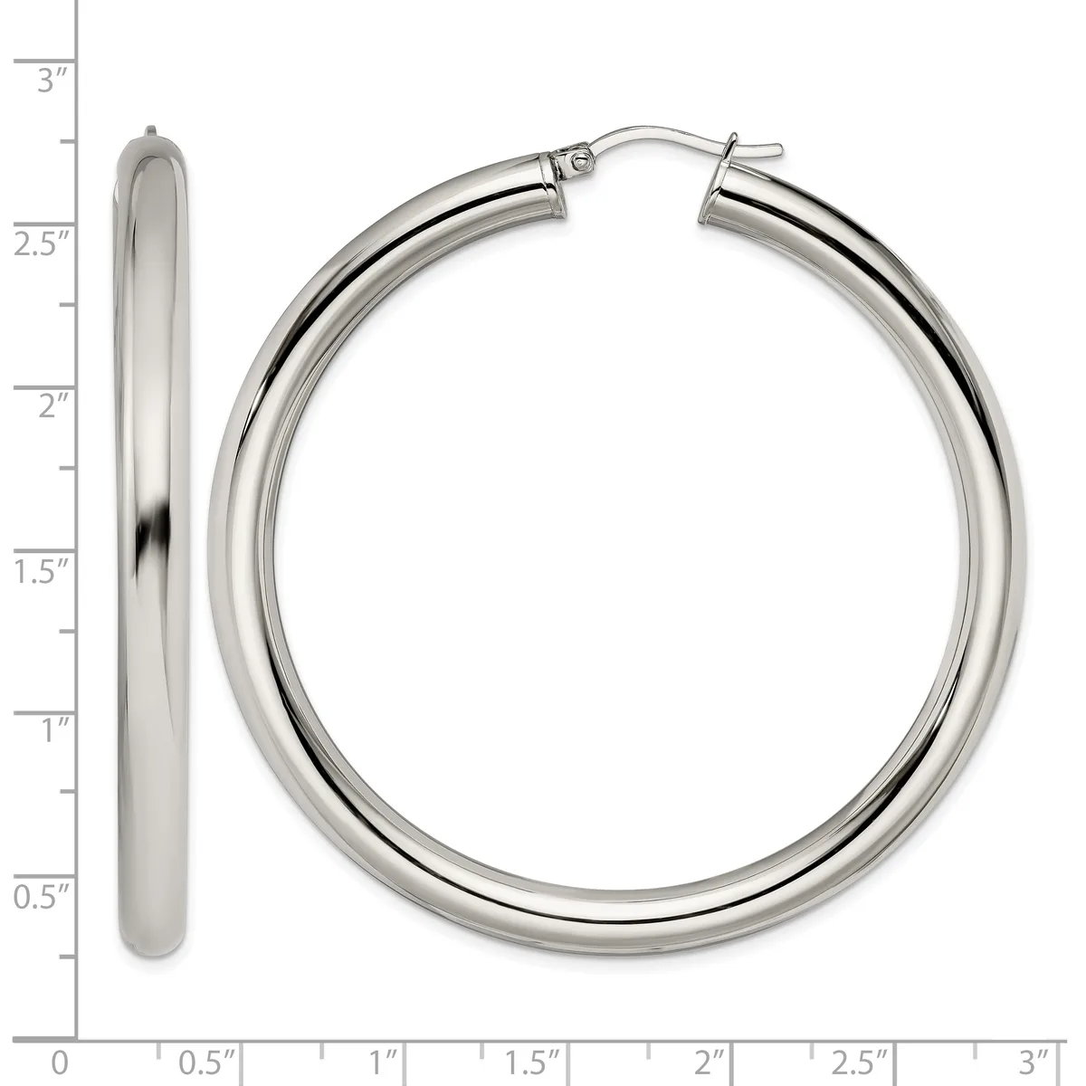 A pair of polished silver hoop earrings with a measurement scale showing their size is approximately 2.5 inches in diameter.