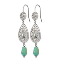 Pair of silver filigree dangle earrings with teardrop-shaped ornamental elements and green stone beads suspended from curved ear wires.