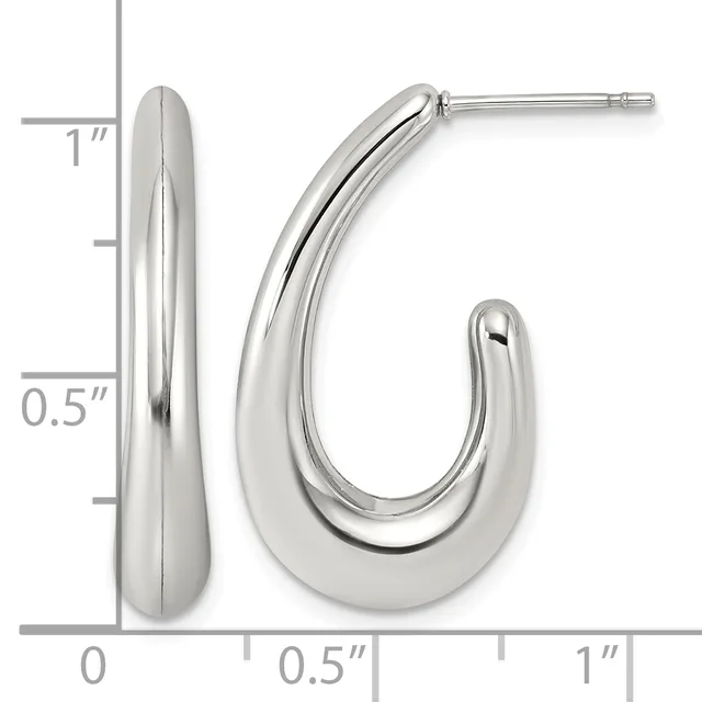 A pair of polished silver chunky curved hoop earrings with posts, displayed against a measurement scale showing approximately one inch in length.
