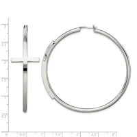Two silver earrings displayed on a measurement grid: a long cross pendant and a polished hoop earring with a hinge closure.