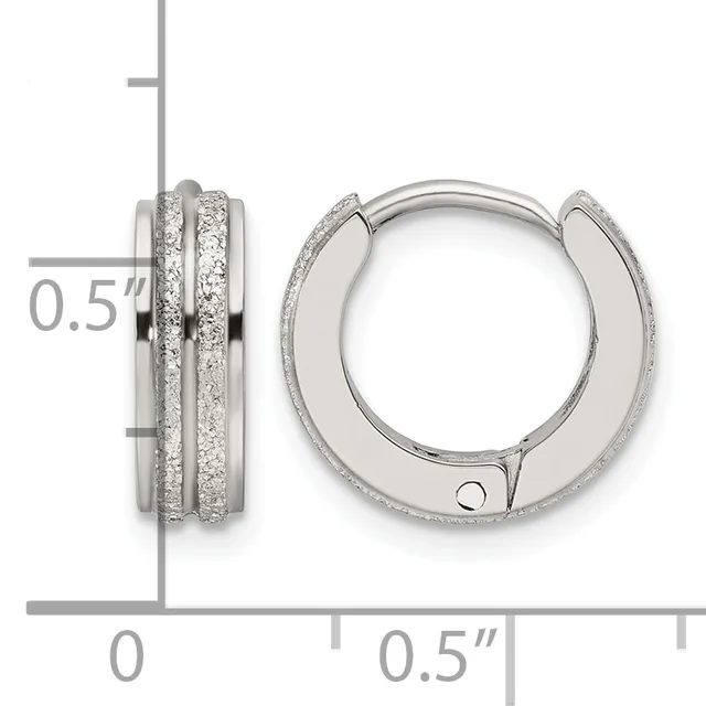 A pair of silver hinged hoop earrings with textured glitter finish sides, shown from front and side views with a measurement scale indicating 0.5 inch width.