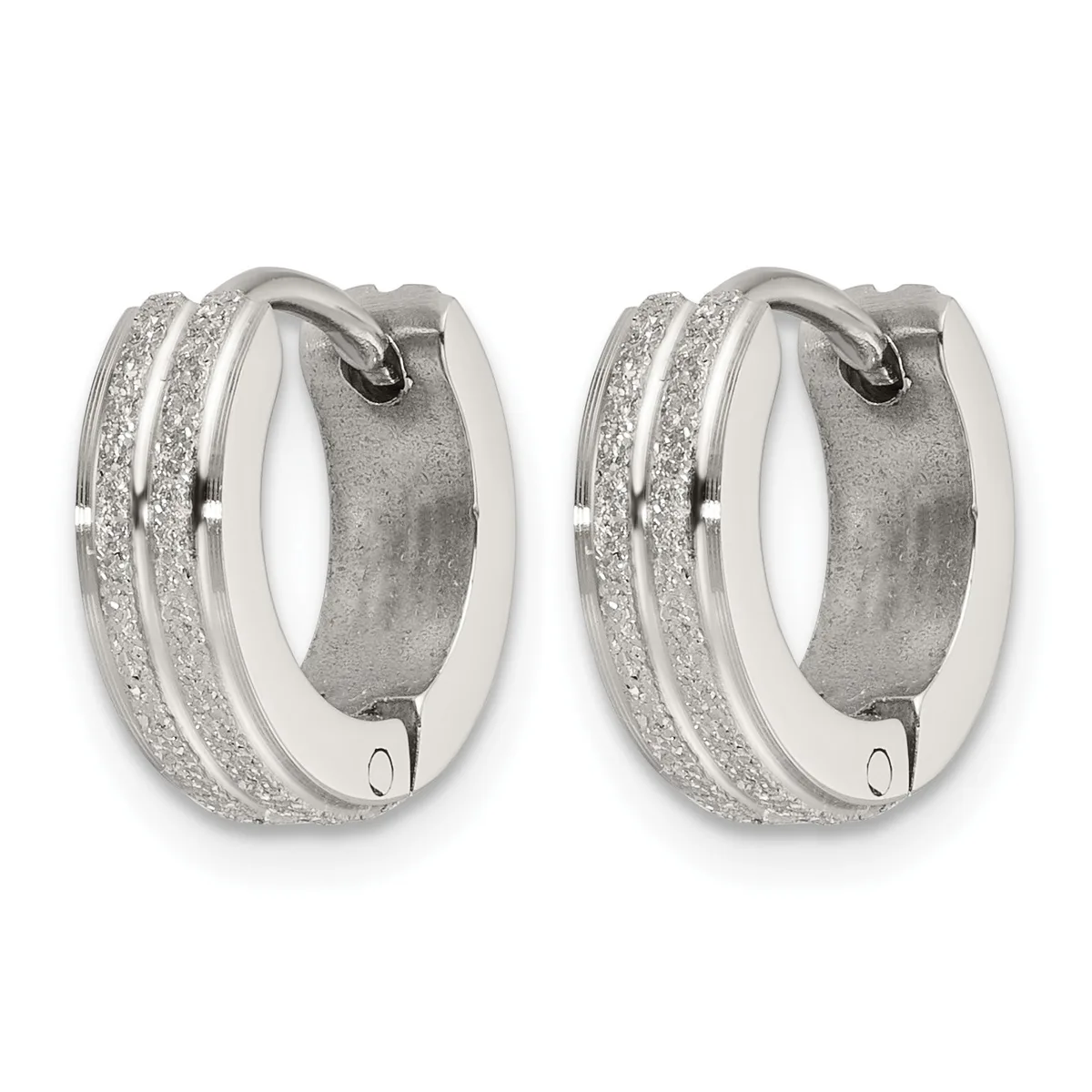 Pair of silver-toned chunky hoop earrings with glittery textured outer surfaces and smooth inner bands, shown from the front.