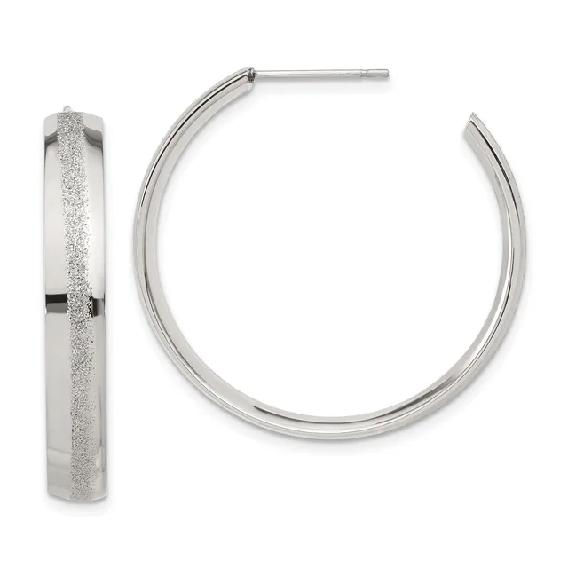 A pair of silver hoop earrings with a textured finish on the front surface and polished edges, shown from front and side views.