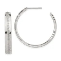 A pair of silver hoop earrings with a textured finish on the front surface and polished edges, shown from front and side views.