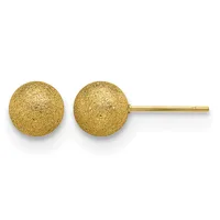 Pair of gold textured sphere stud earrings with a post and backing on a white background.