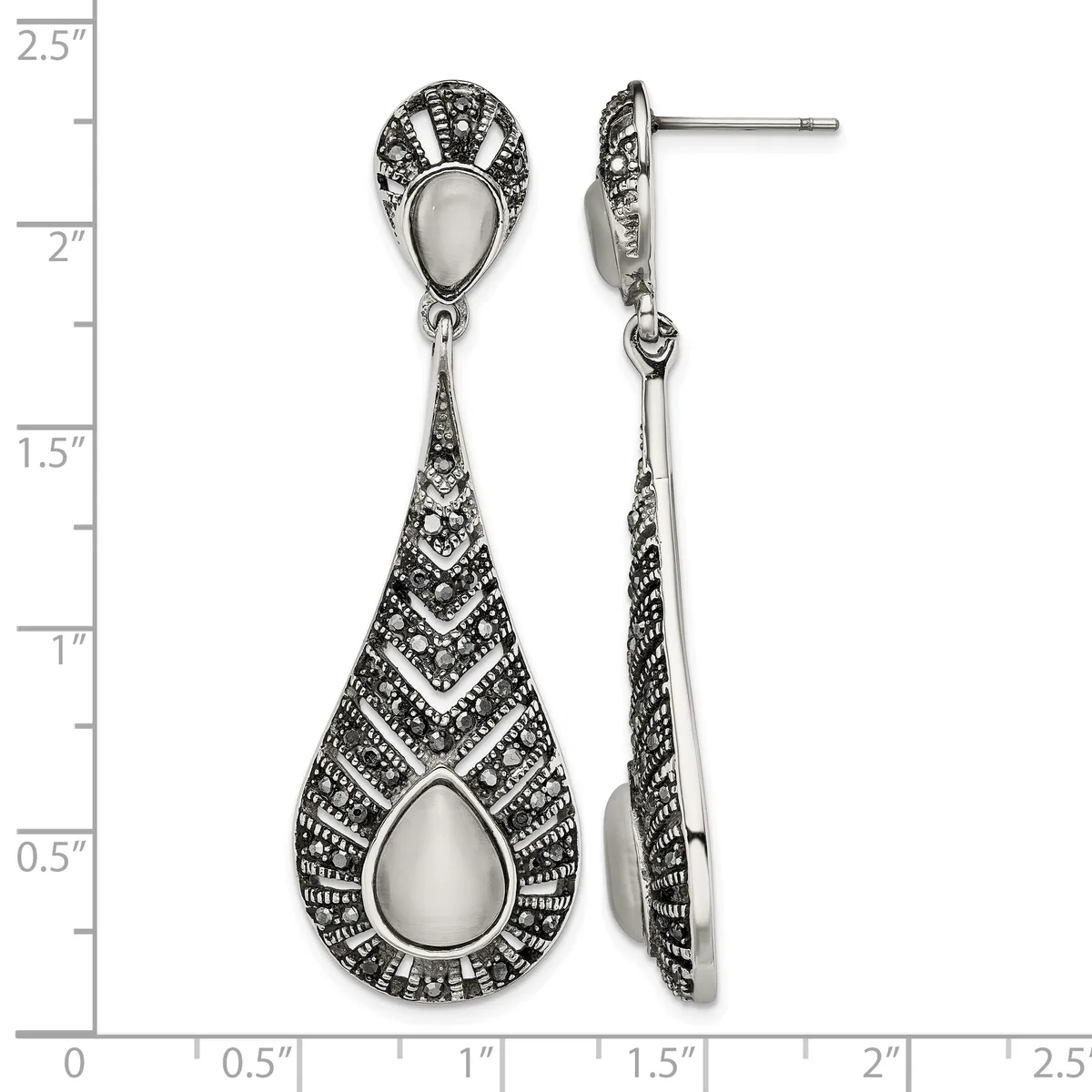 Pair of ornate silver teardrop dangle earrings with mother-of-pearl stone centers and detailed geometric patterning, shown front and side view against a measurement scale.