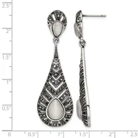 Pair of ornate silver teardrop dangle earrings with mother-of-pearl stone centers and detailed geometric patterning, shown front and side view against a measurement scale.