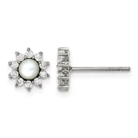 A pair of silver stud earrings featuring a central white pearl surrounded by a halo of round diamonds, shown from front and side views.