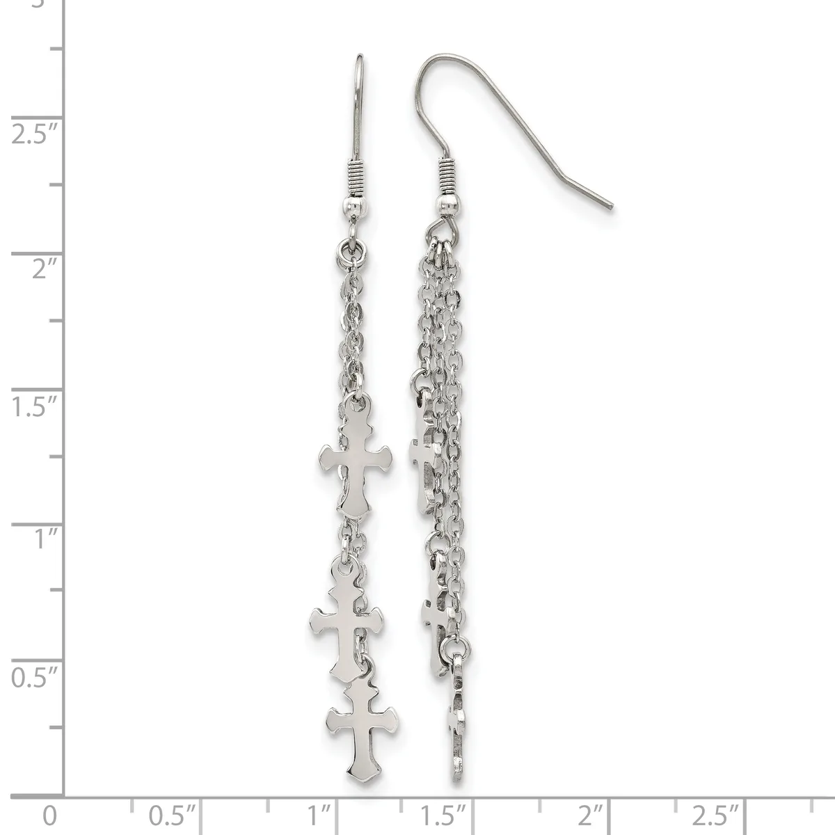 Pair of silver-toned dangle earrings with delicate chain strands and cross charms, displayed against a measurement ruler.