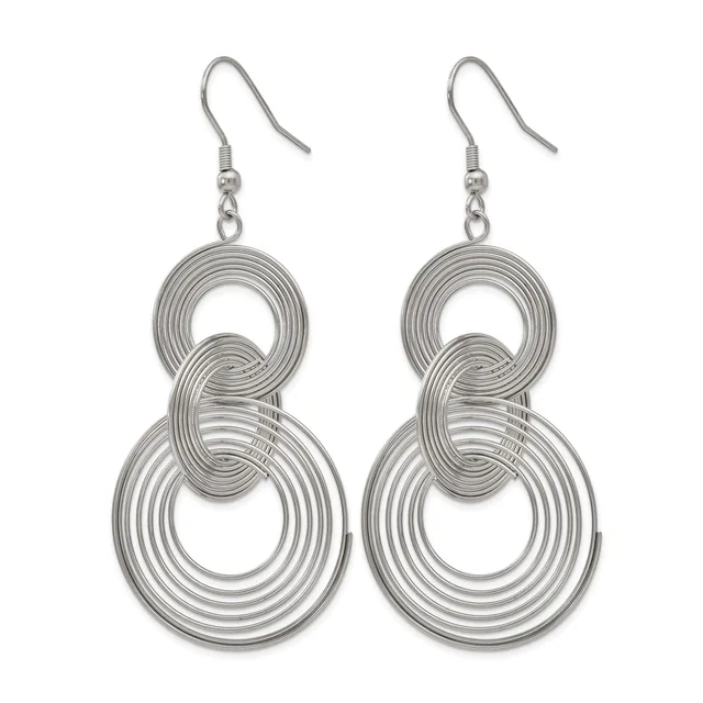 Pair of silver-toned dangle earrings with interlocking concentric circular loops hanging from fish hook wires.