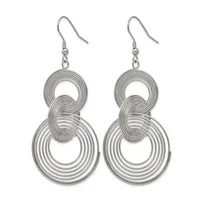 Pair of silver-toned dangle earrings with interlocking concentric circular loops hanging from fish hook wires.