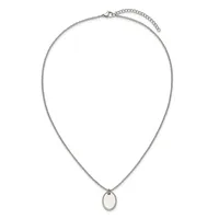 A silver-toned chain necklace with an adjustable length and a small oval pendant featuring a dotted border design.