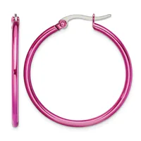 A pair of bright pink tubular hoop earrings with hinged closures, shown from front and side views.