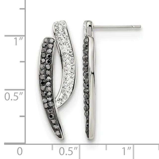 Pair of curved silver earrings with black and white crystal accents, shown front and side view against a measurement scale.