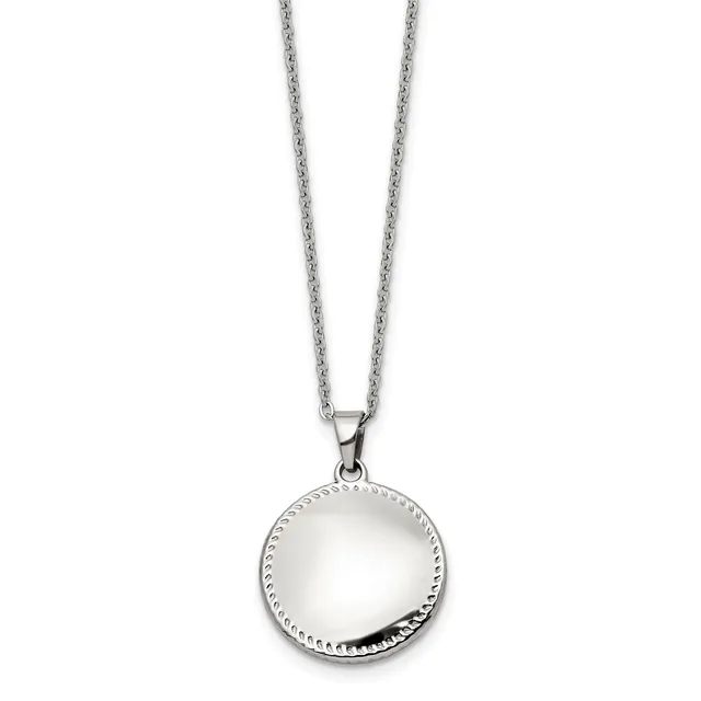 A silver chain necklace with a round pendant featuring a polished dome center surrounded by a beaded border.