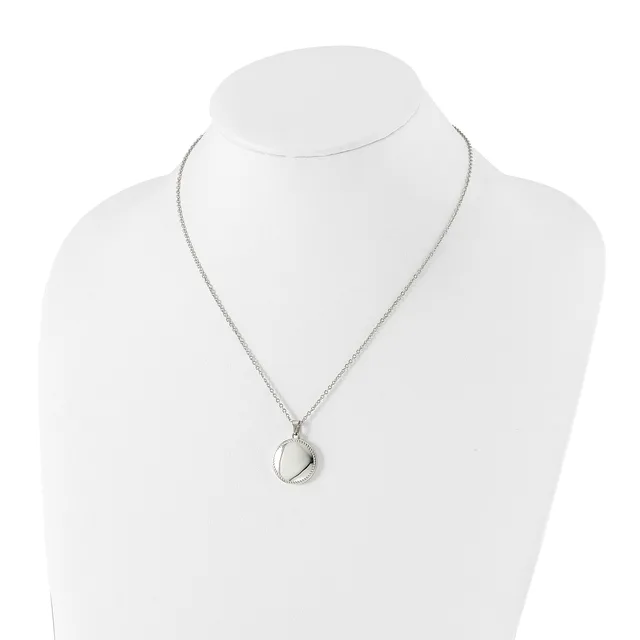 Silver-toned pendant necklace with a small teardrop-shaped stone or crystal hanging from a delicate chain, displayed on a white mannequin bust.