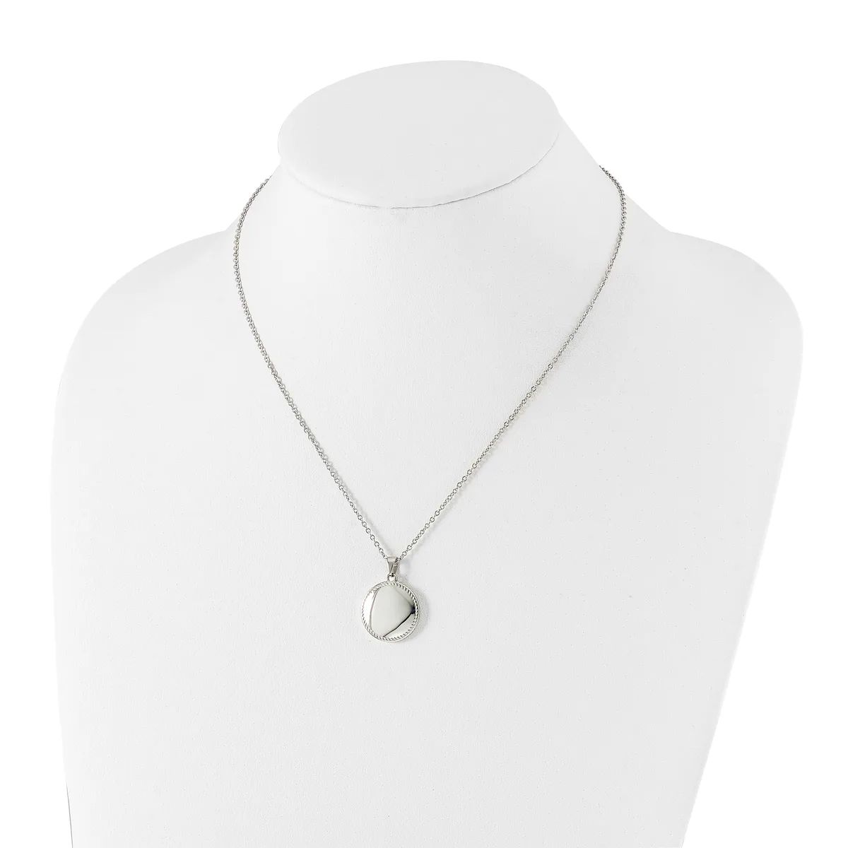 Silver-toned pendant necklace with a small teardrop-shaped stone or crystal hanging from a delicate chain, displayed on a white mannequin bust.