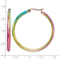 A pair of multicolored hoop earrings with a rainbow gradient finish, shown next to a ruler indicating they measure approximately 1.5 inches in diameter.