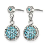 Pair of silver dangle earrings with turquoise cabochon studs and larger circular pendants paved with turquoise rounds and seed pearls.