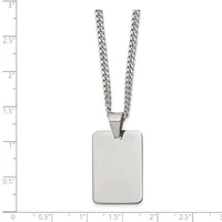 A stainless steel rectangular pendant hangs from a curb chain, displayed against a measurement scale showing the pendant is approximately one inch tall.