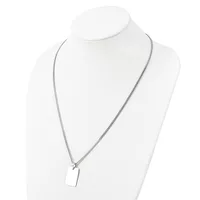 A silver-toned chain necklace with a small rectangular pendant displayed on a white mannequin bust.