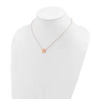 Rose gold necklace with a small round pendant displayed on a white mannequin bust.
