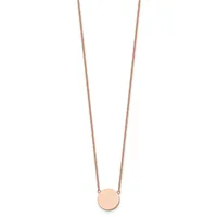 Rose gold necklace with a thin chain and a small circular pendant hanging at center.