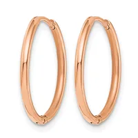 A pair of polished rose gold hoop earrings with oval shapes and hinged closures, displayed against a white background.