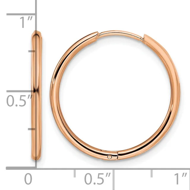 Rose gold polished hollow hoop earrings with hinged posts, shown front and side view with measurement scale indicating approximately one inch in diameter and half inch in thickness.