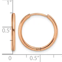 A pair of rose gold hoop earrings with a polished finish, shown from front and side view with measurement scale indicating approximately one inch in length and half inch in width.